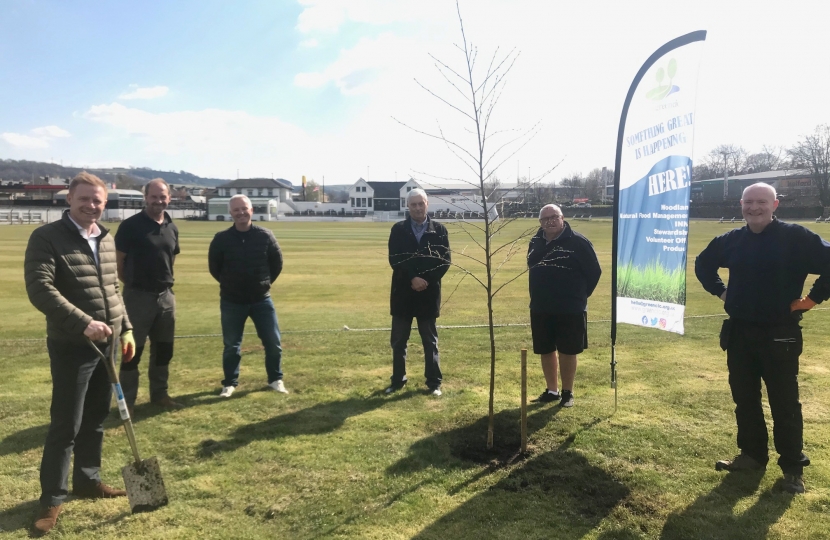 Robbie Moore MP planting tree