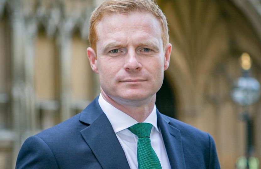 Robbie Moore MP