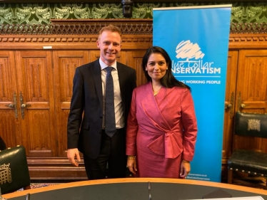 Robbie Moore MP with Home Secretary, Priti Patel. 